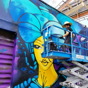 “Muñeca del Barrio” Mural by Fiorella Podesta, Art by Fio
